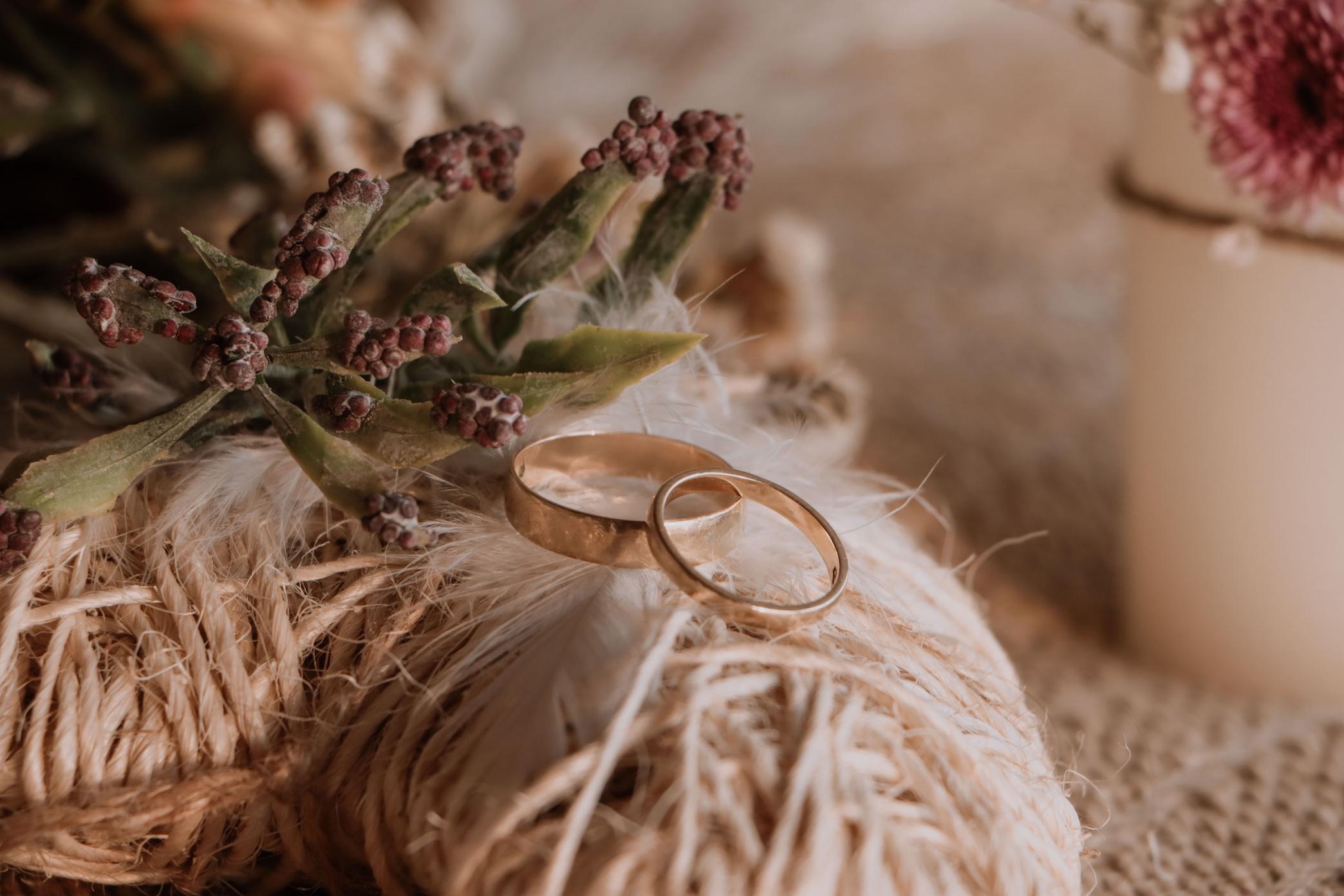 Gold Wedding Rings on Rustic Bridal Bouquet